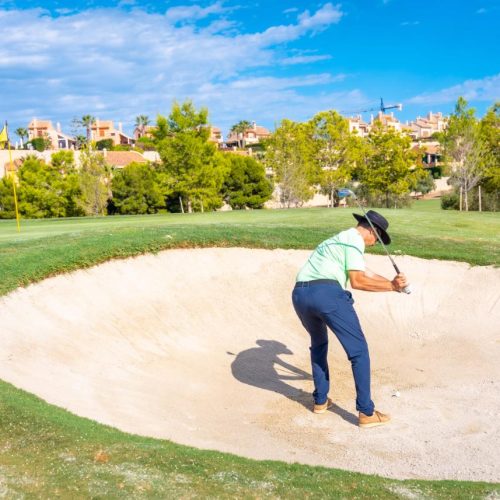 man-playing-golf-in-the-bunker-hitting-the-ball-w-2023-11-27-04-59-14-utc.jpg
